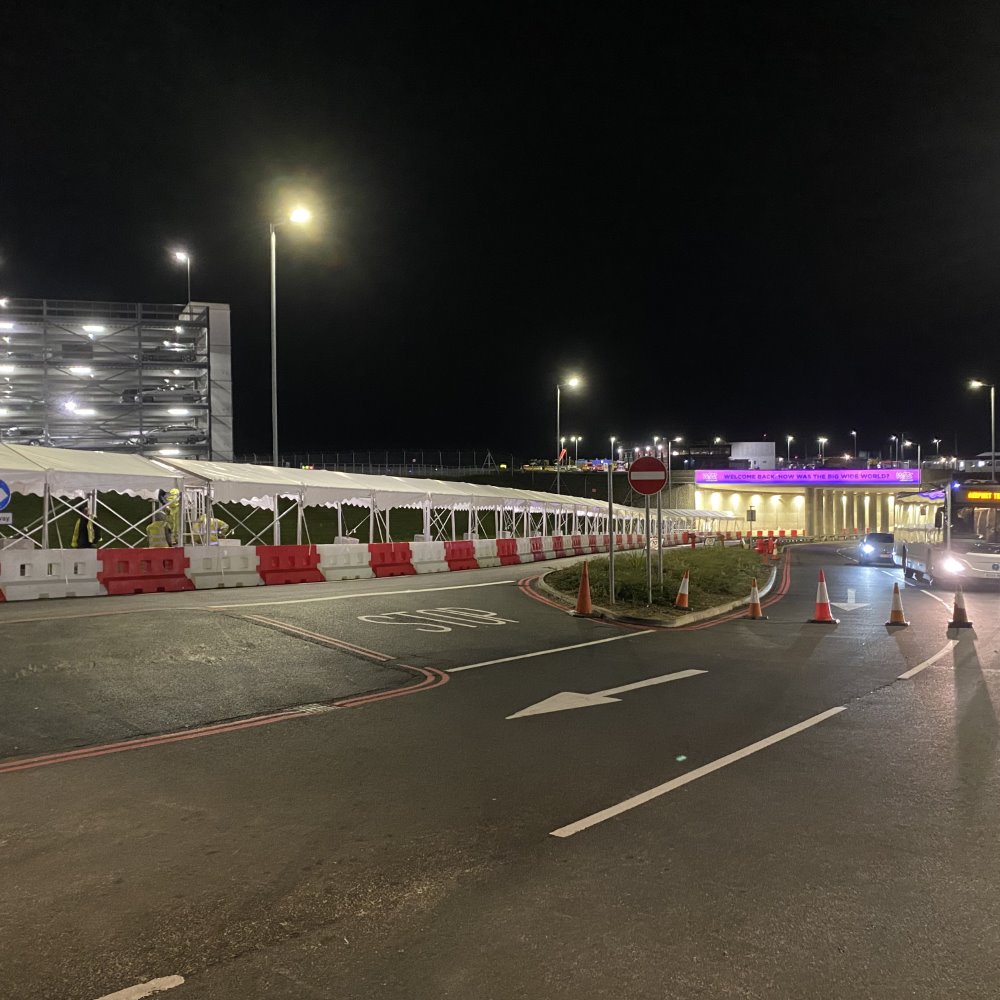 Night view of a corporate marquee setup.
